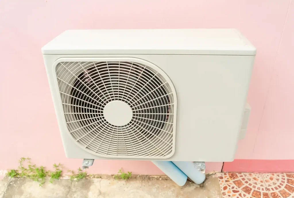 Air conditioner outdoor unit needing repair in Al Aziziyah