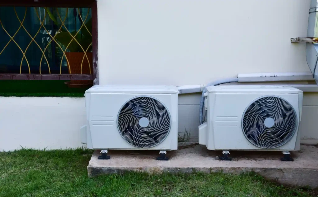 Two outdoor AC units installed at a residential property in Riyadh