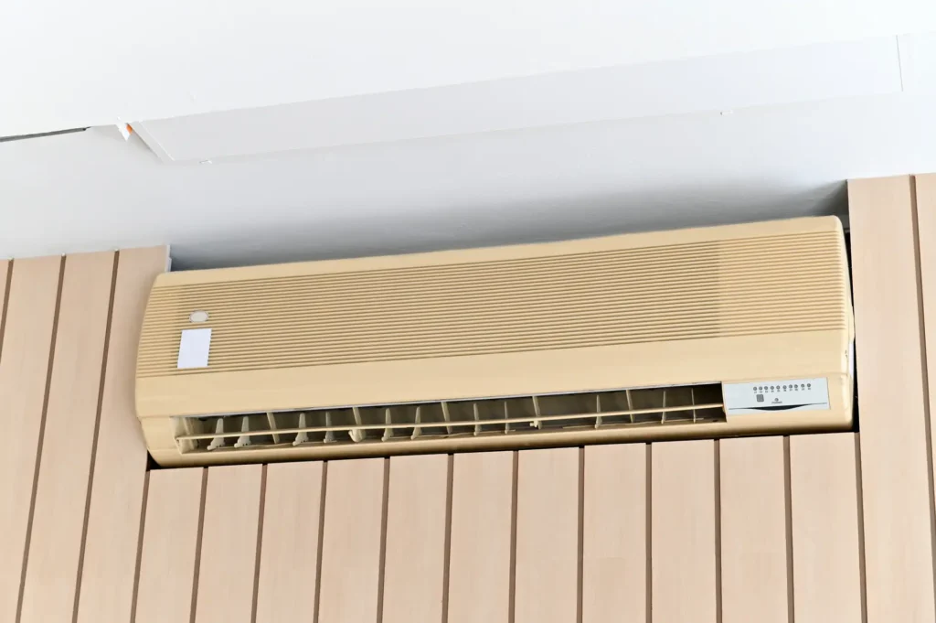 Wall mounted air conditioner in a room