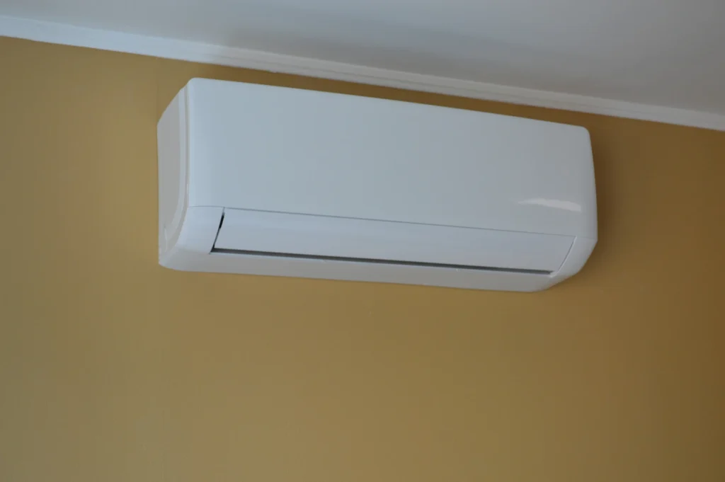 White wall mounted air conditioner in a room